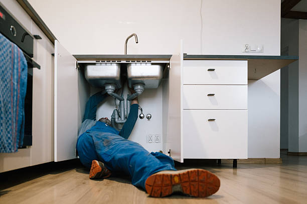 Professional Drain Cleaning technician working in Lewes, DE